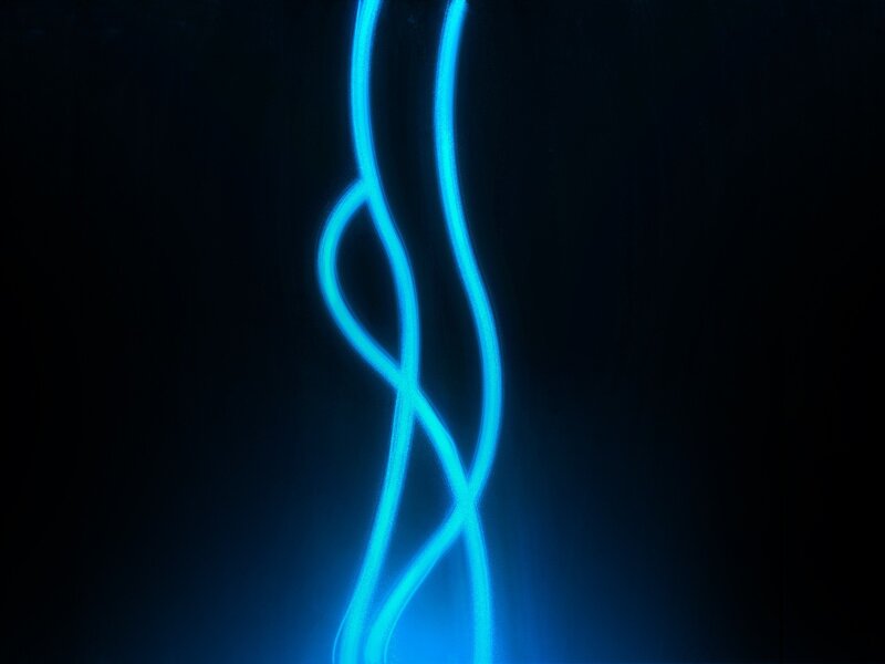 blue light trails on black