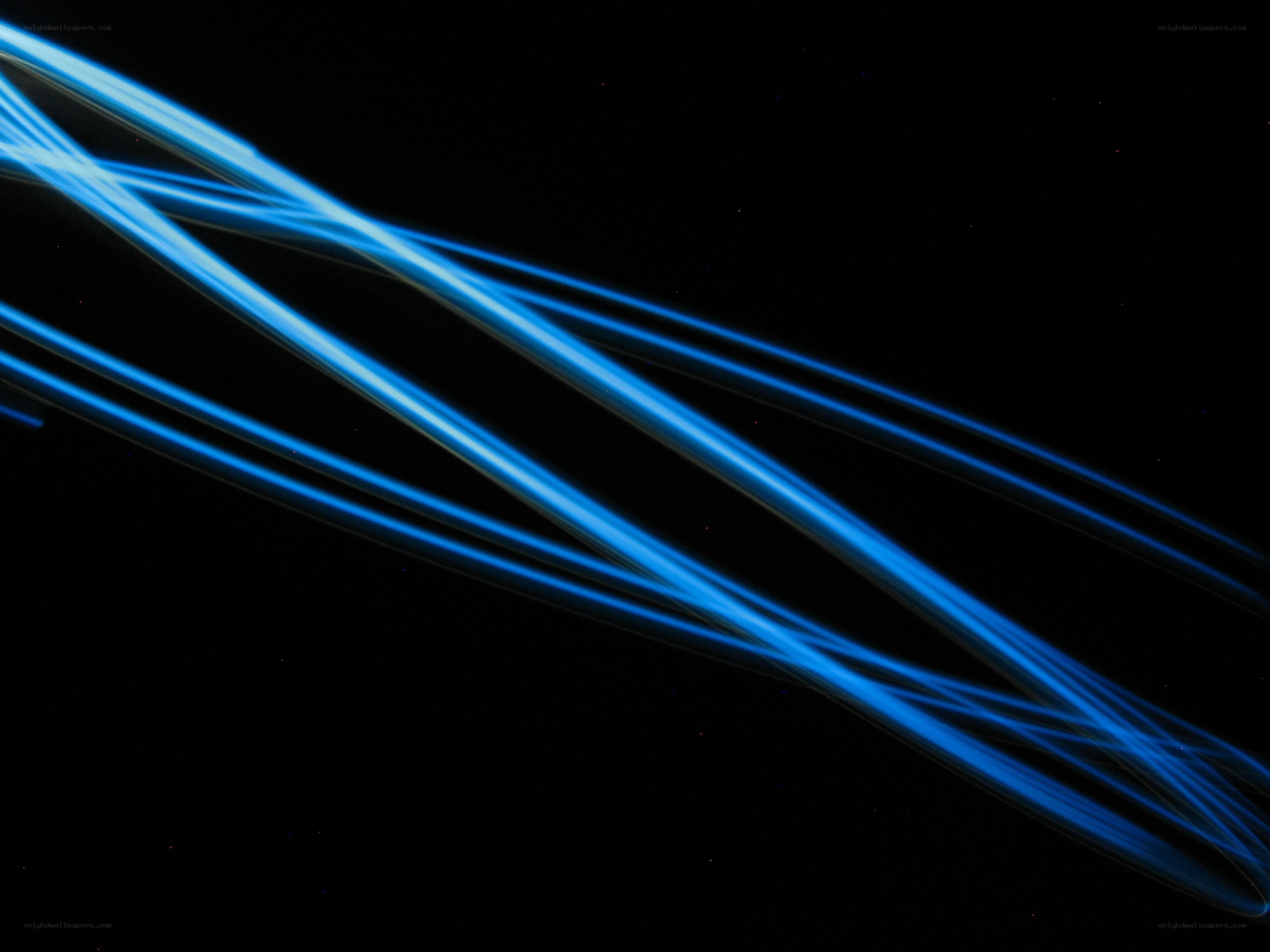 Blue light trails on black
