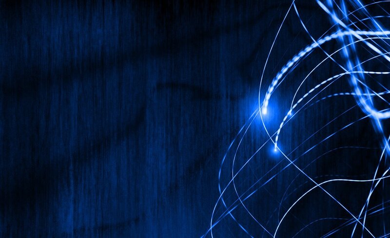 blue light trails on dark background