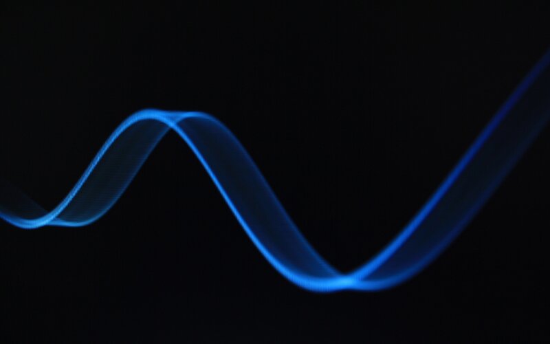 blue light wave on black