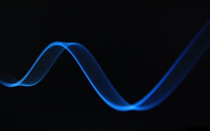 Blue light wave on black