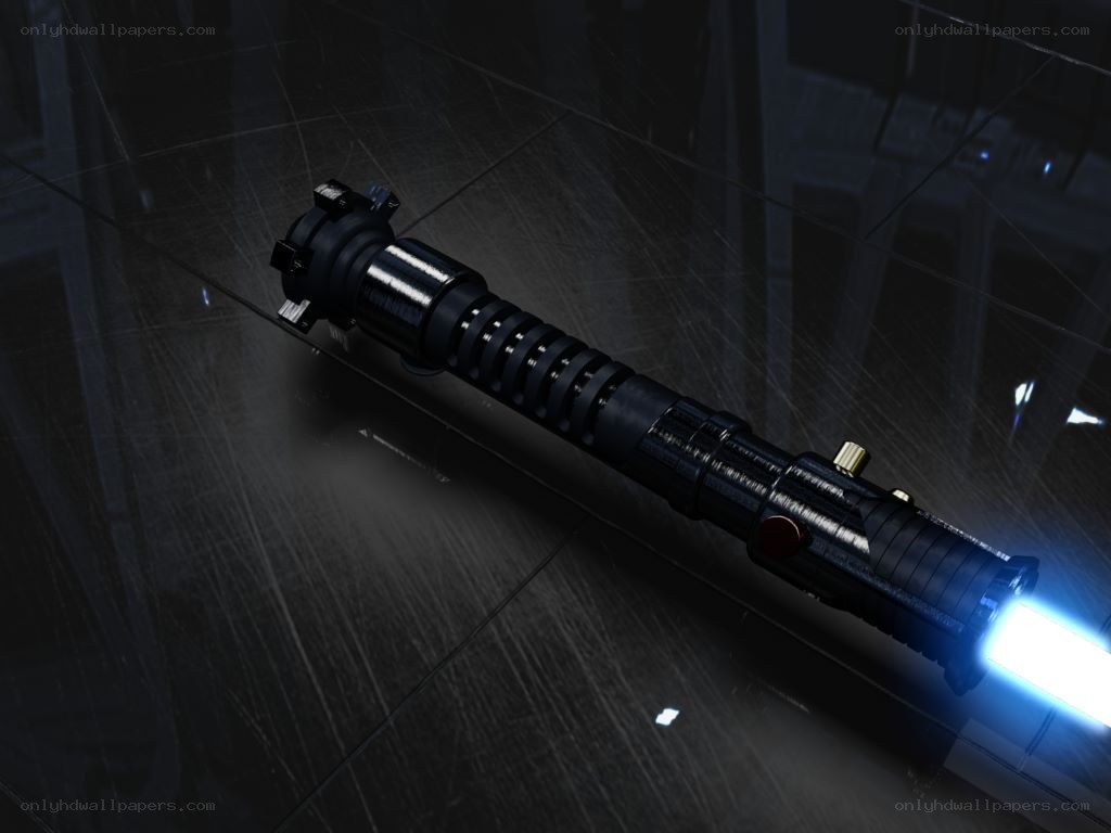 Blue lightsaber on dark floor