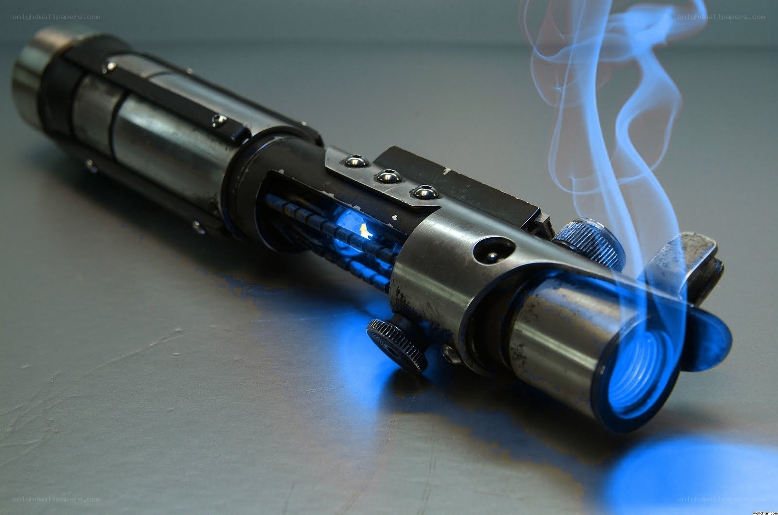 Blue lightsaber with smoke
