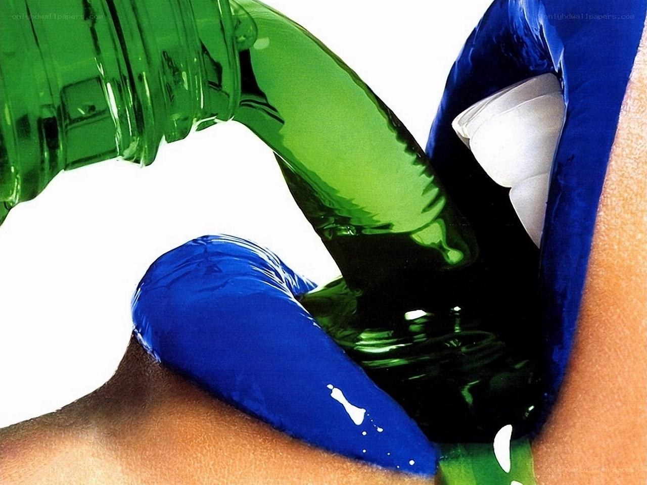 blue lips pouring green liquid