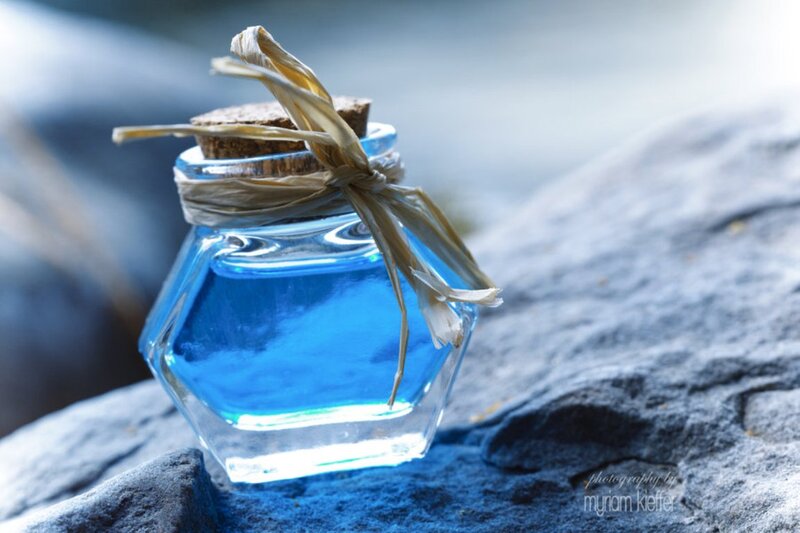Blue Liquid in Glass Bottle