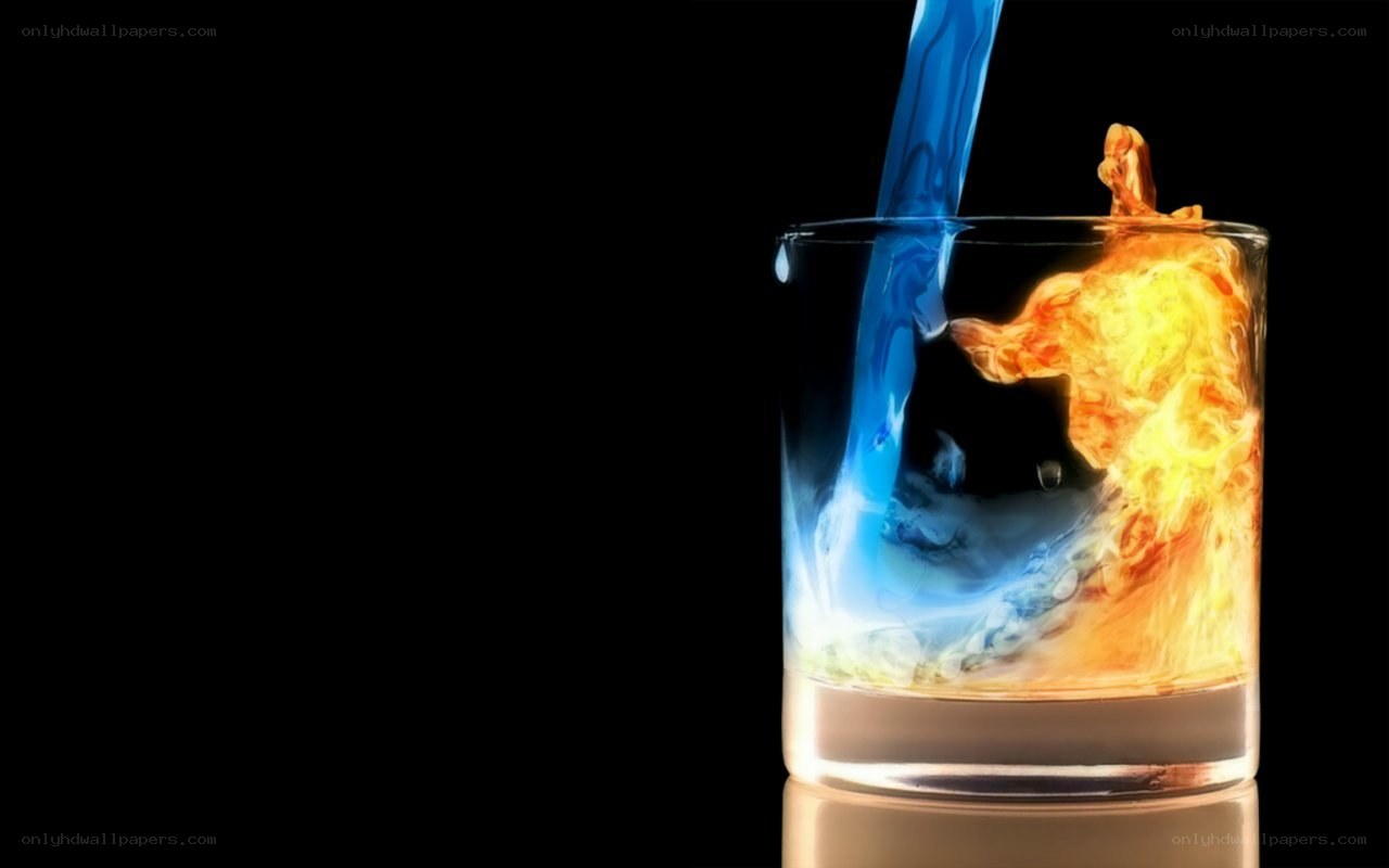 blue liquid pouring into glass