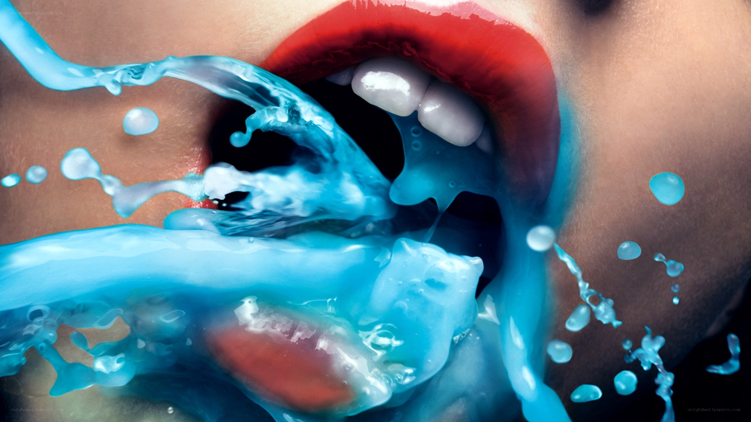 blue liquid splashing from mouth