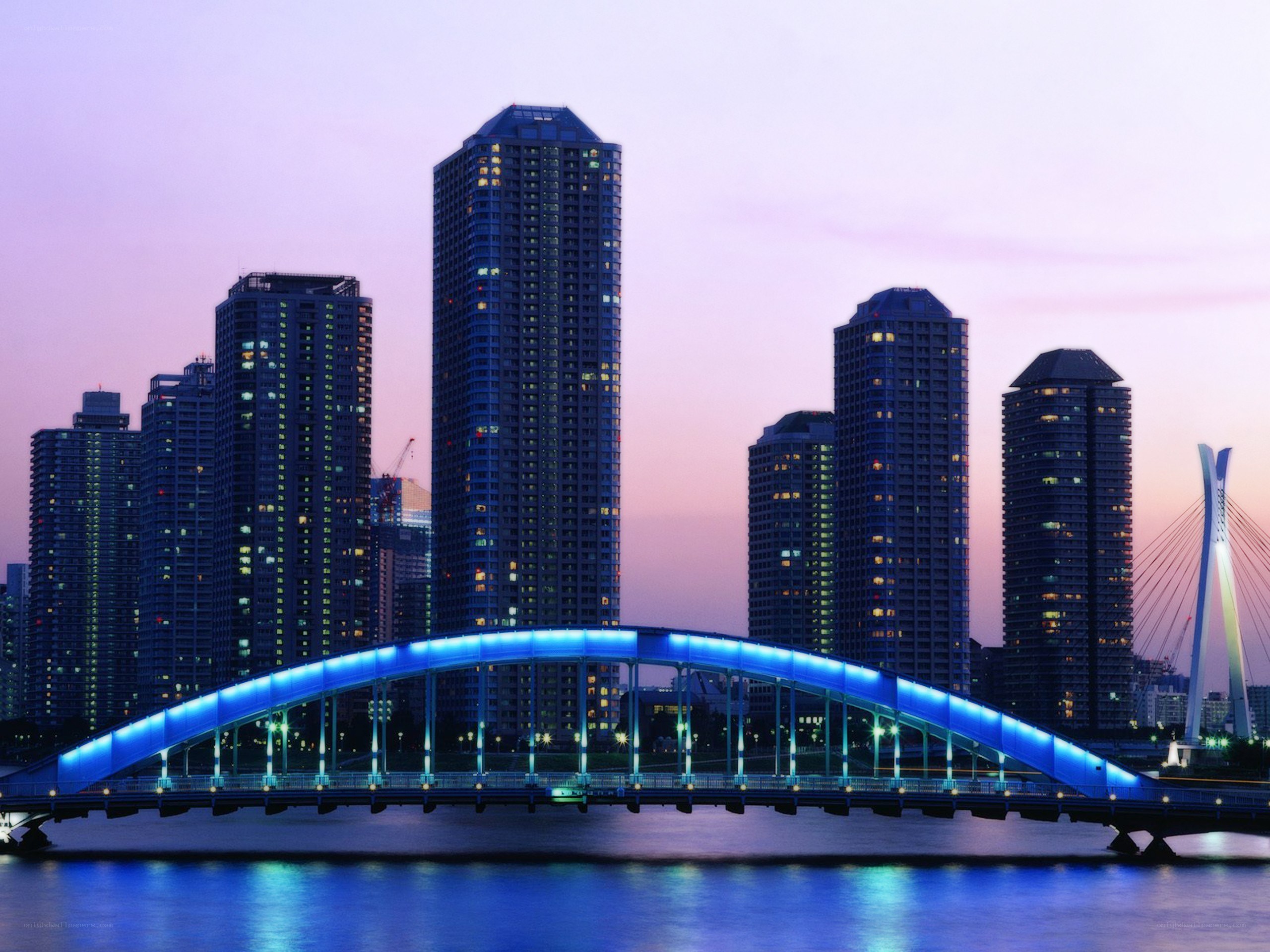 Blue-lit bridge at dusk