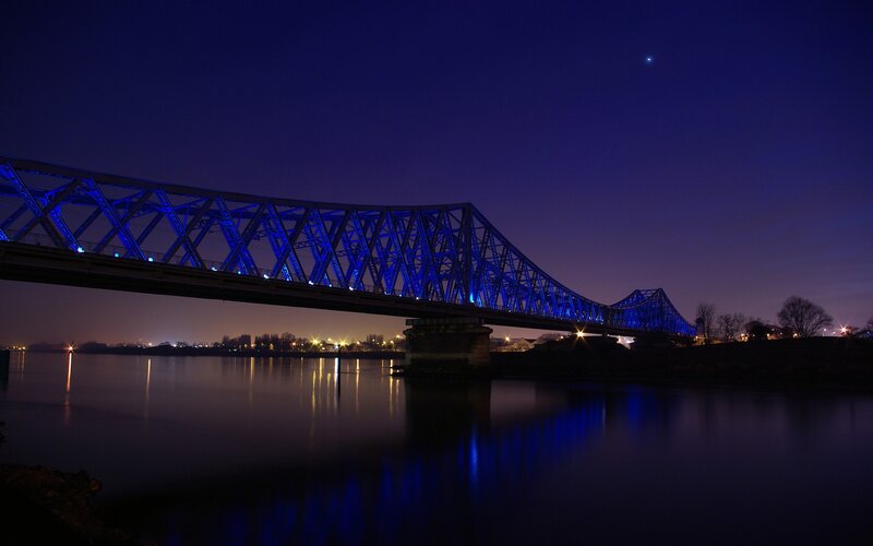 Blue-lit Bridge at Night — Blue, Serene, Photograph, River