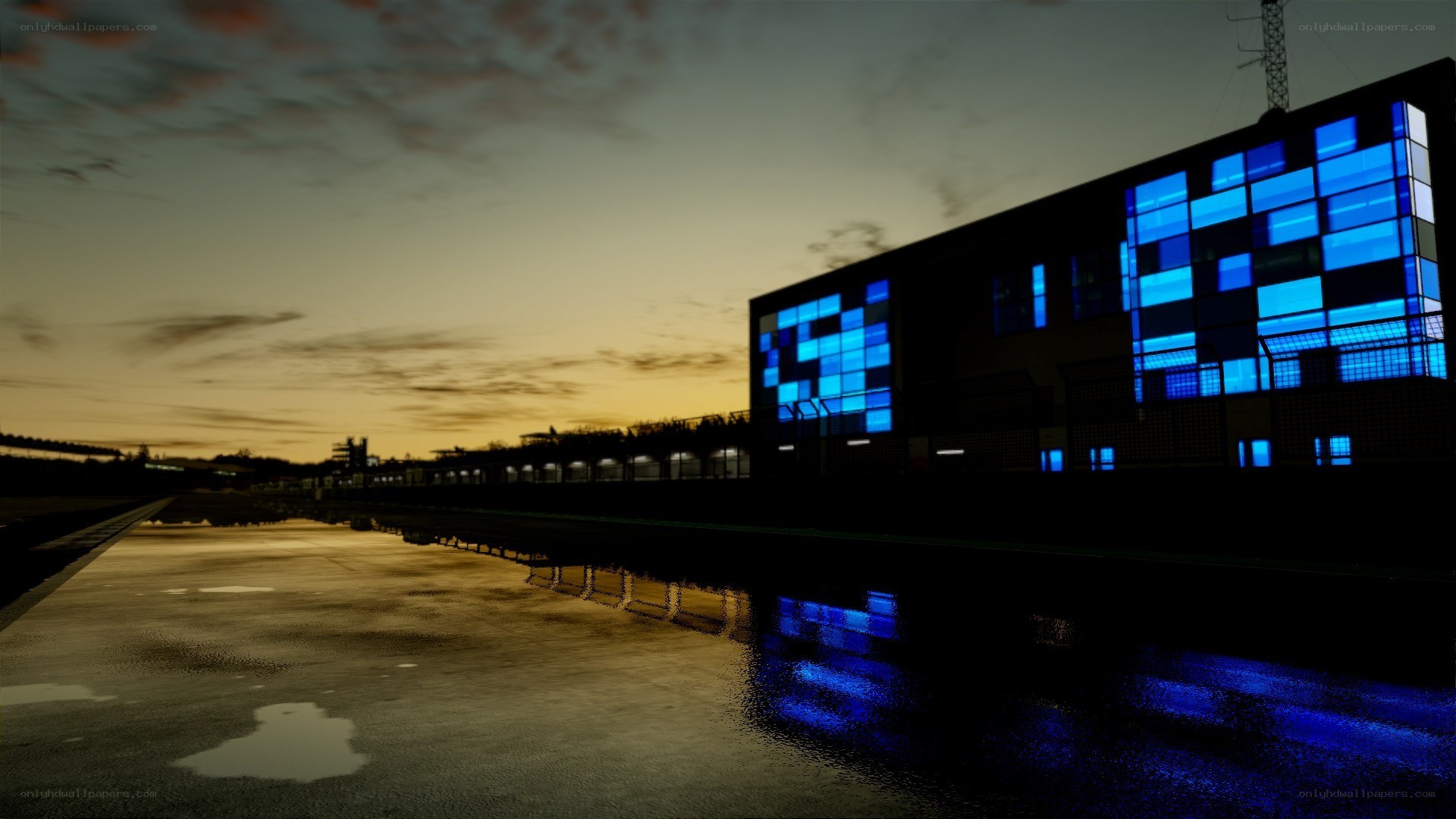 blue-lit building at dusk