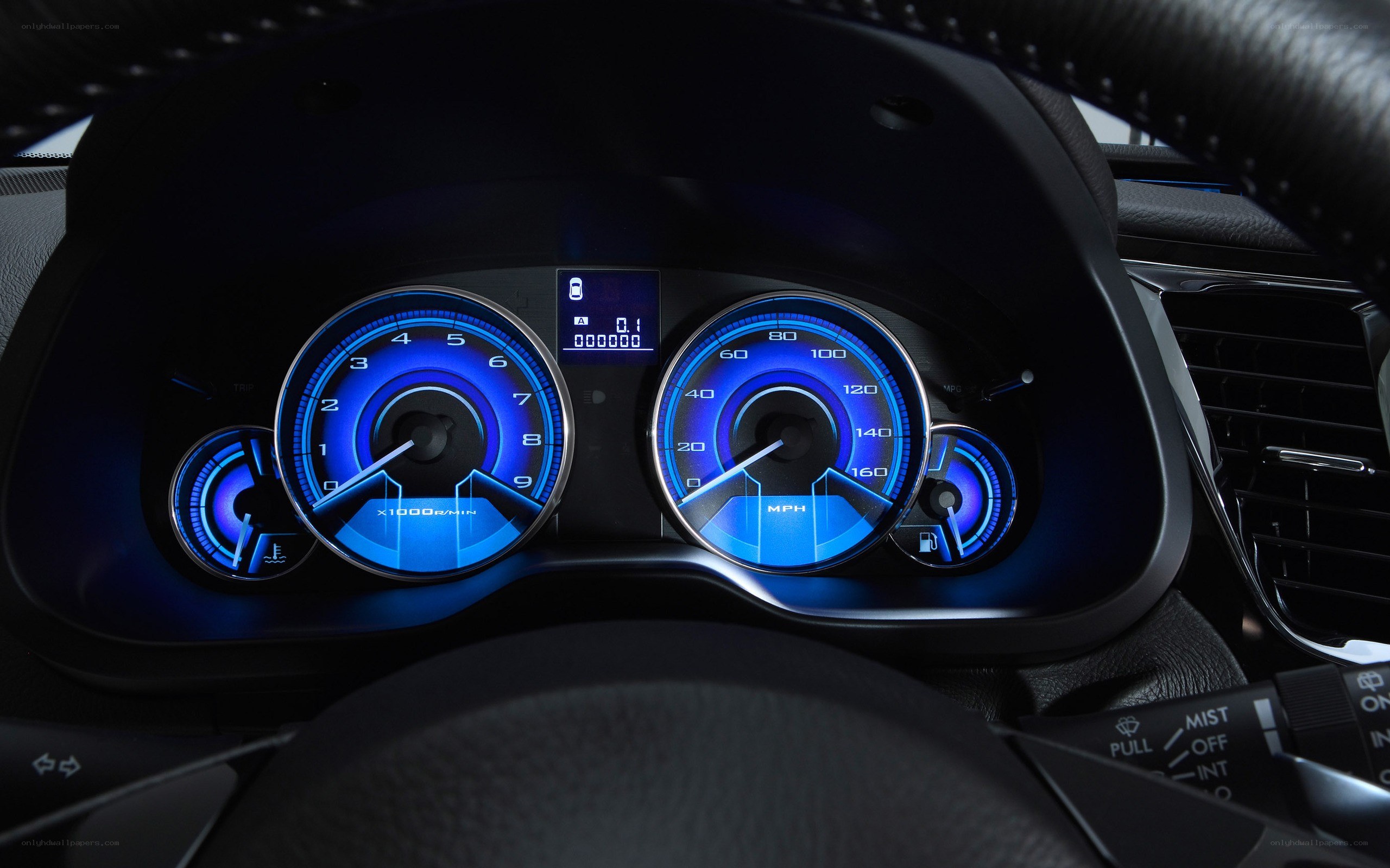 blue-lit car dashboard