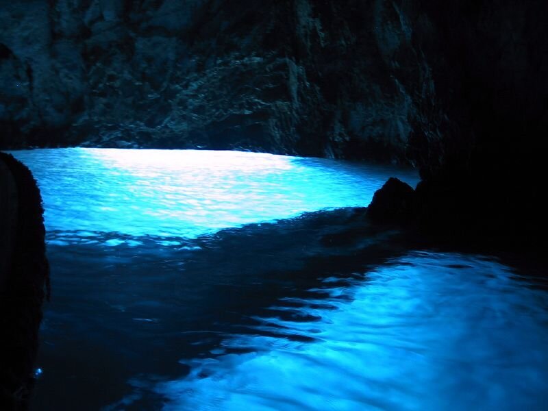 Blue-lit Cave Water