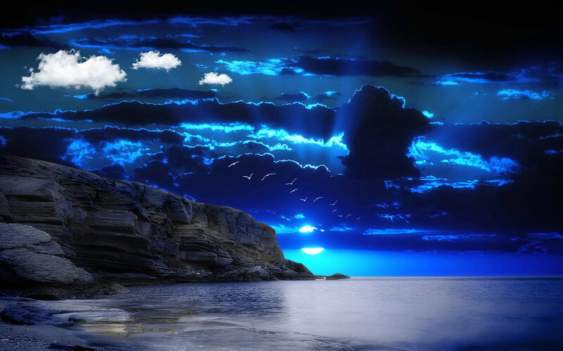 Blue-lit Coastline at Night