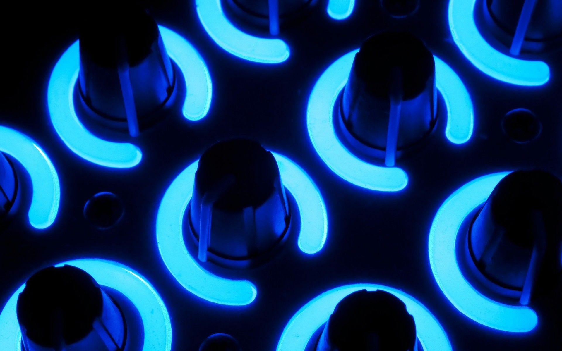 blue-lit control knobs