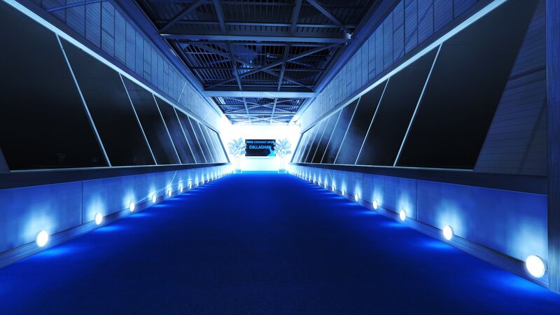 blue-lit corridor with sign