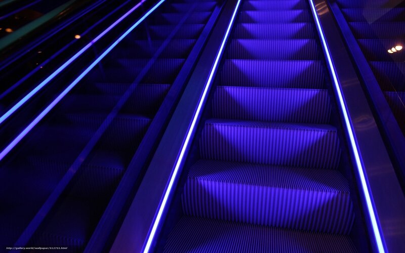 Blue-lit escalator steps