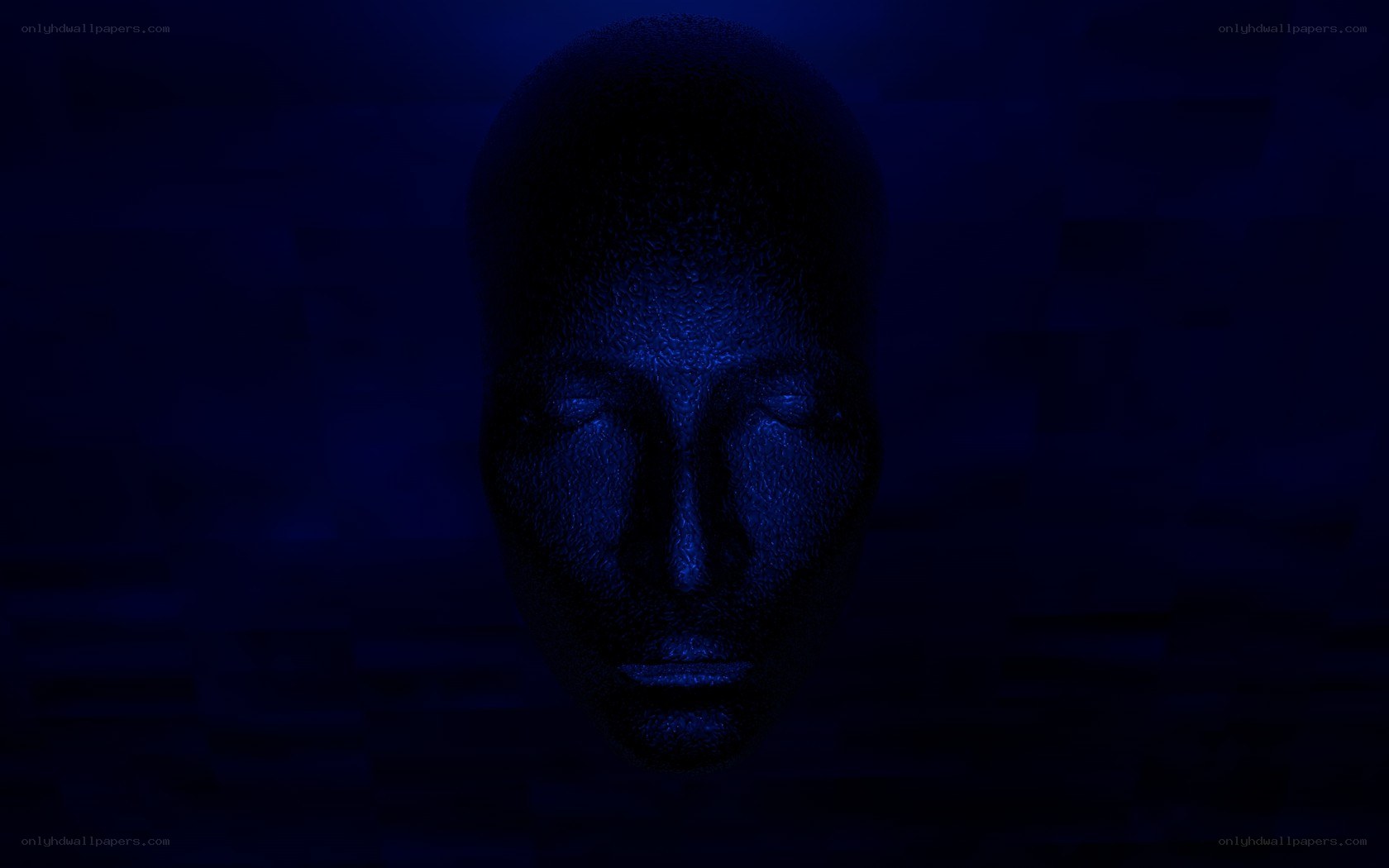 blue-lit face sculpture