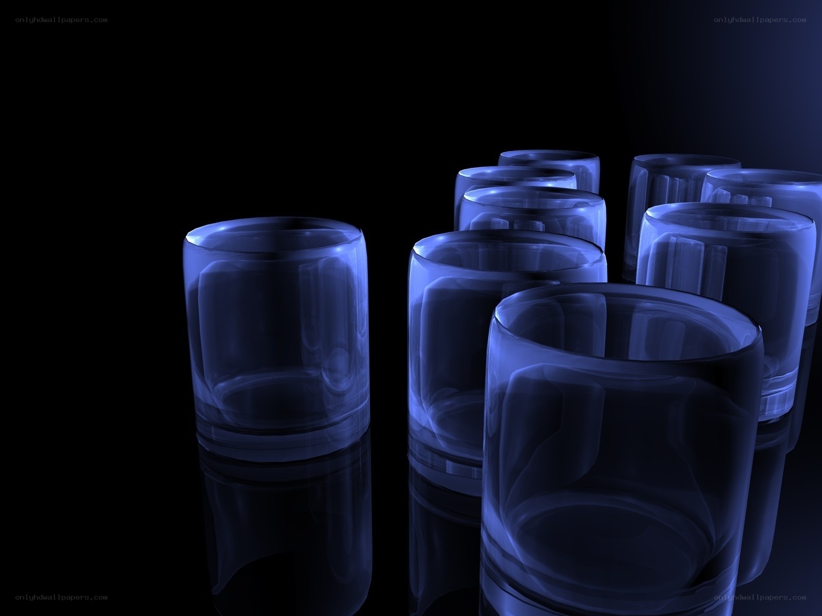 Blue-lit glassware on black