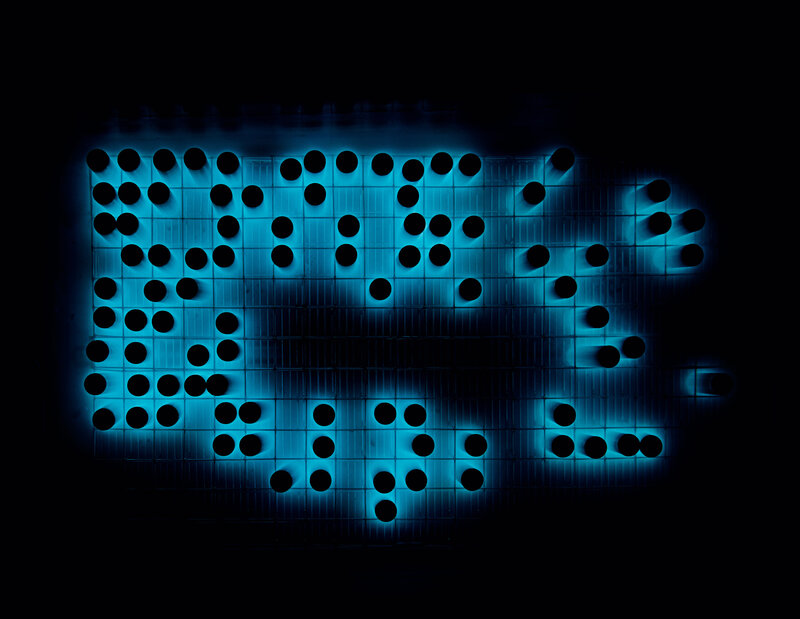 Blue-lit grid art installation