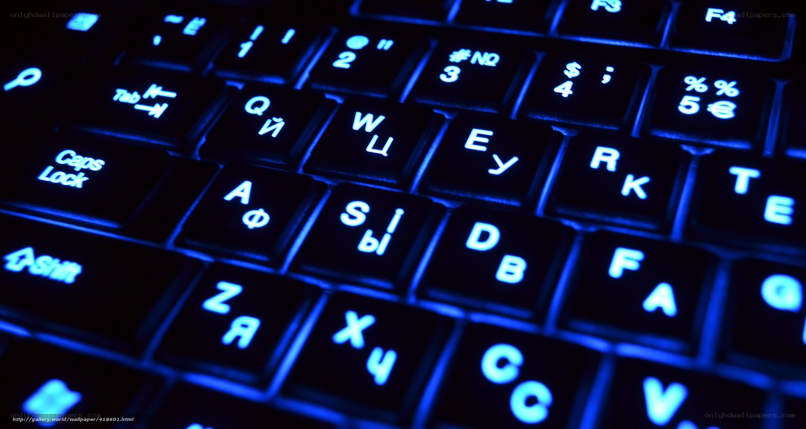 blue-lit keyboard with cyrillic letters