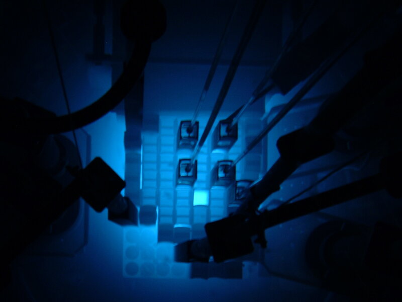 blue-lit mechanical components
