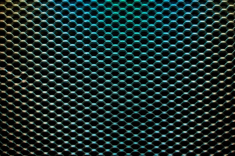 blue-lit metal mesh pattern