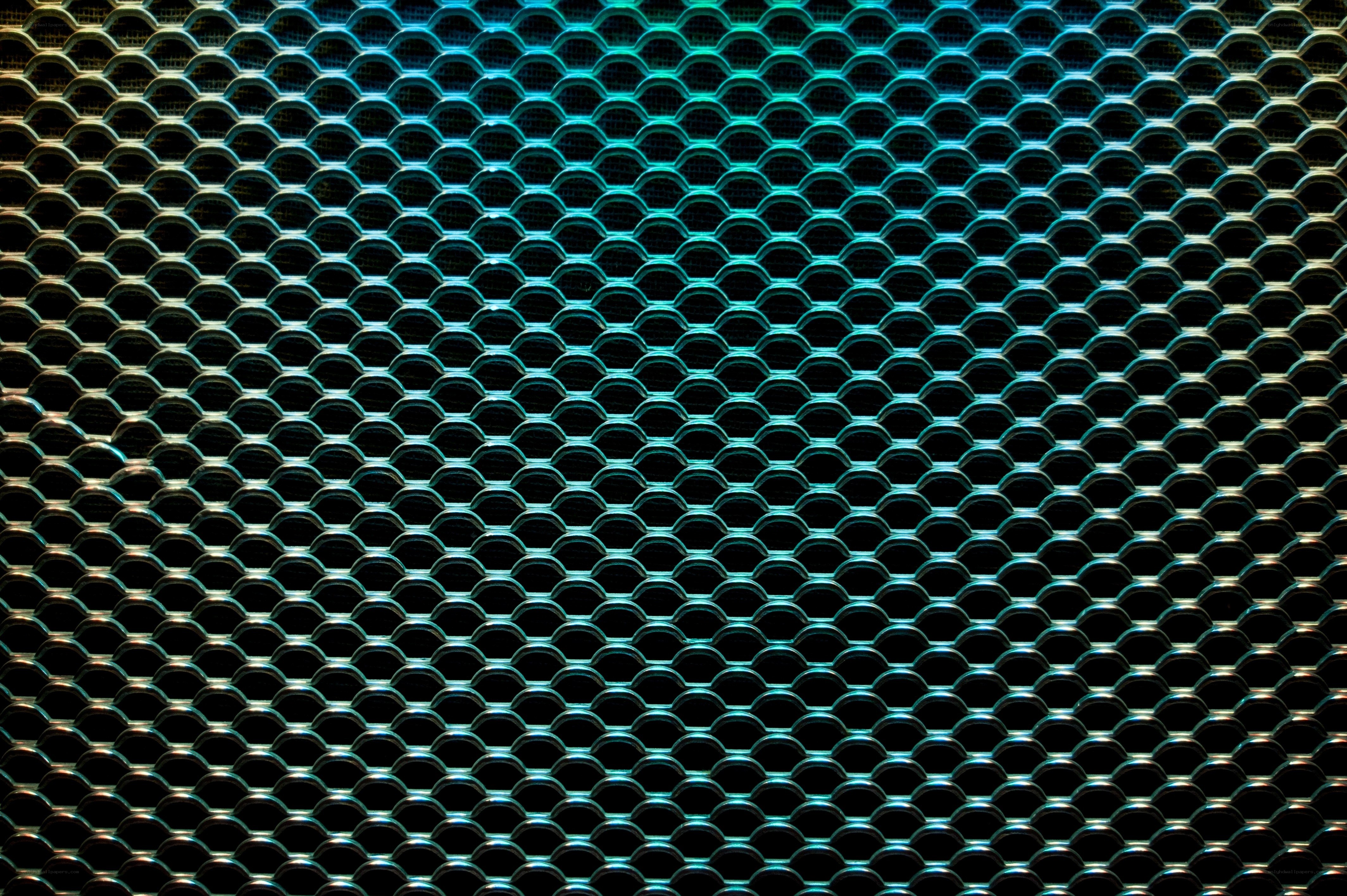 blue-lit metal mesh pattern