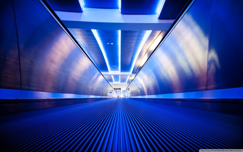 Blue-lit Moving Walkway