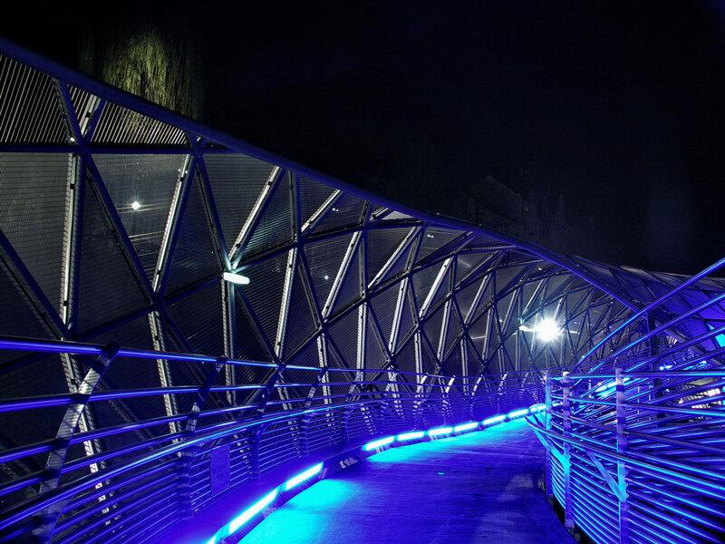 Blue-lit Pedestrian Bridge