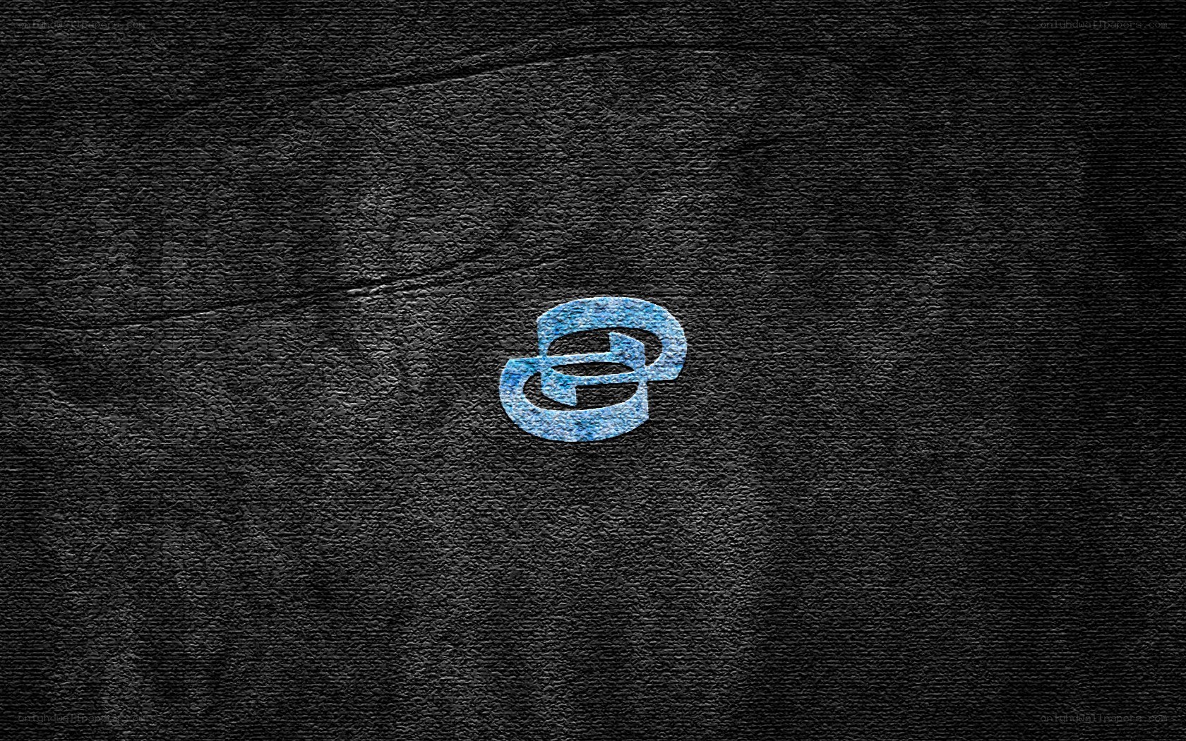 blue logo on dark textured background
