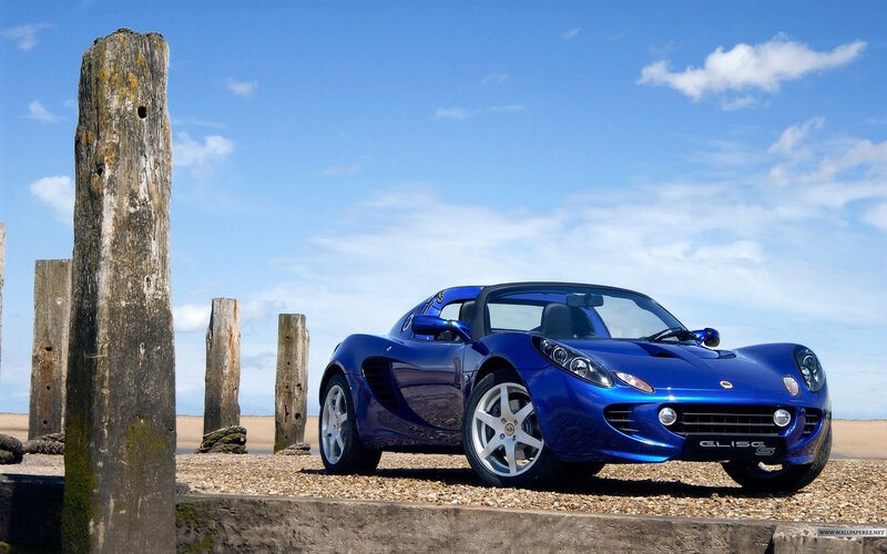 Blue Lotus Elise on a beach