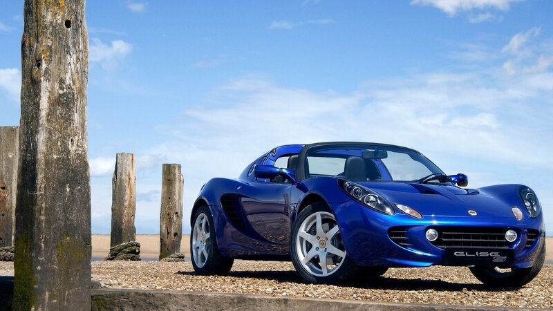 Blue Lotus Elise on a beach