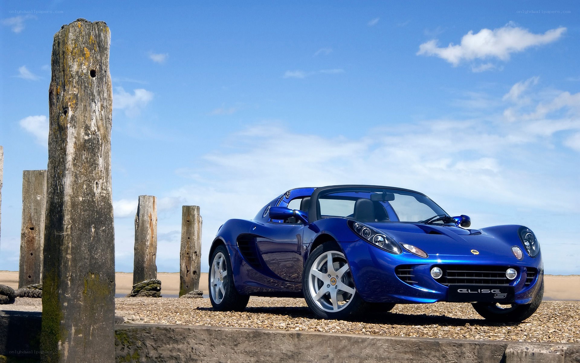 Blue Lotus Elise on beach