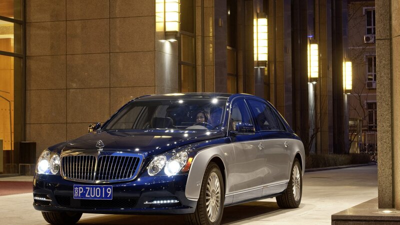 Blue Luxury Sedan — Dramatic, Night, Photograph, Car, Building, License Plate
