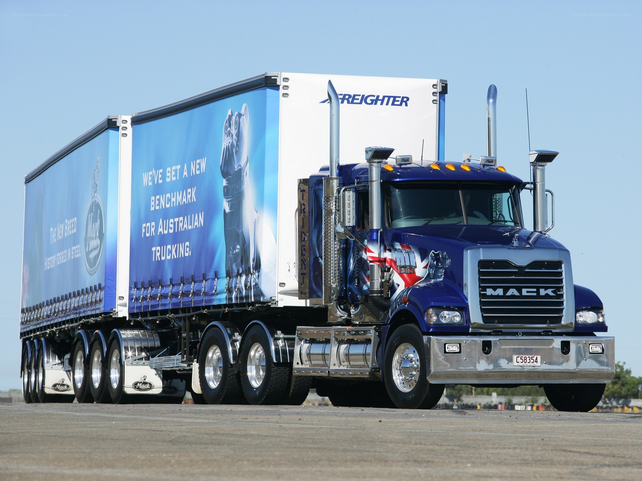 Blue Mack truck with trailer