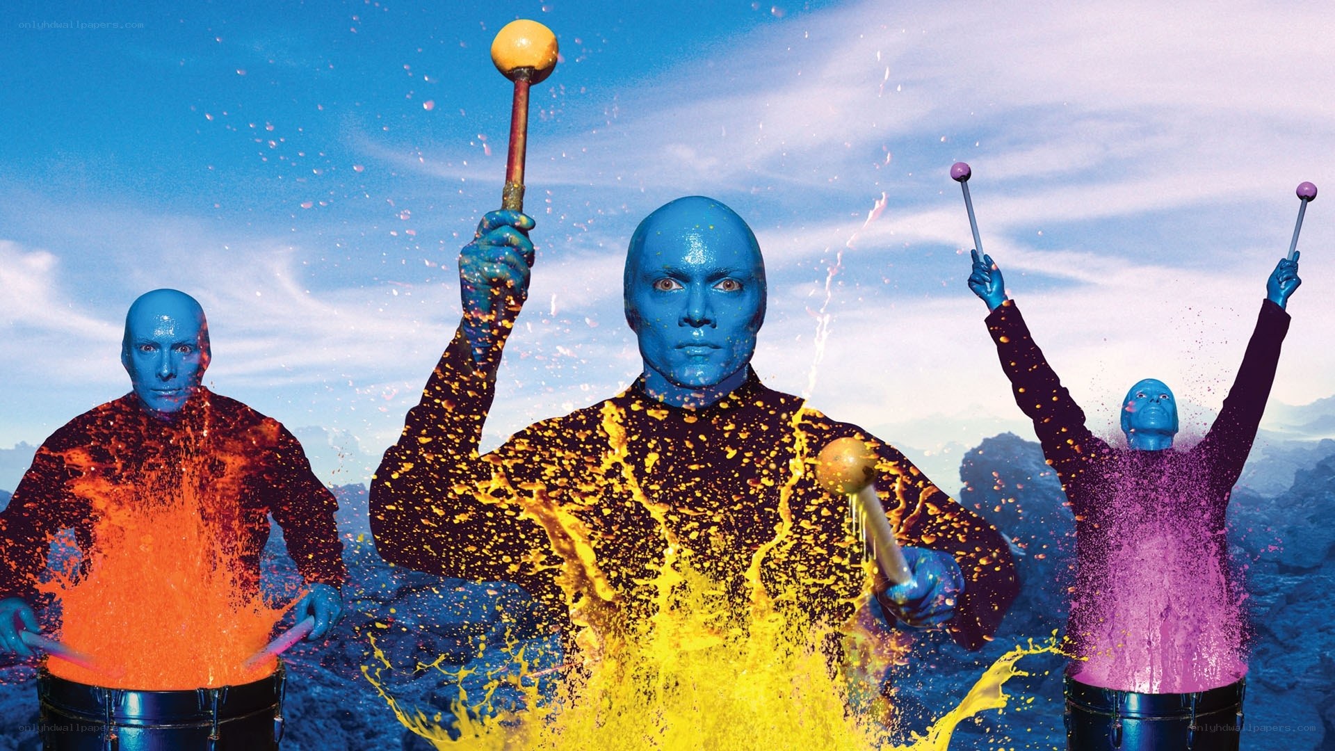 Blue Man Group performing