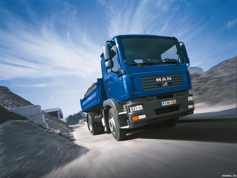 Blue MAN truck on a road