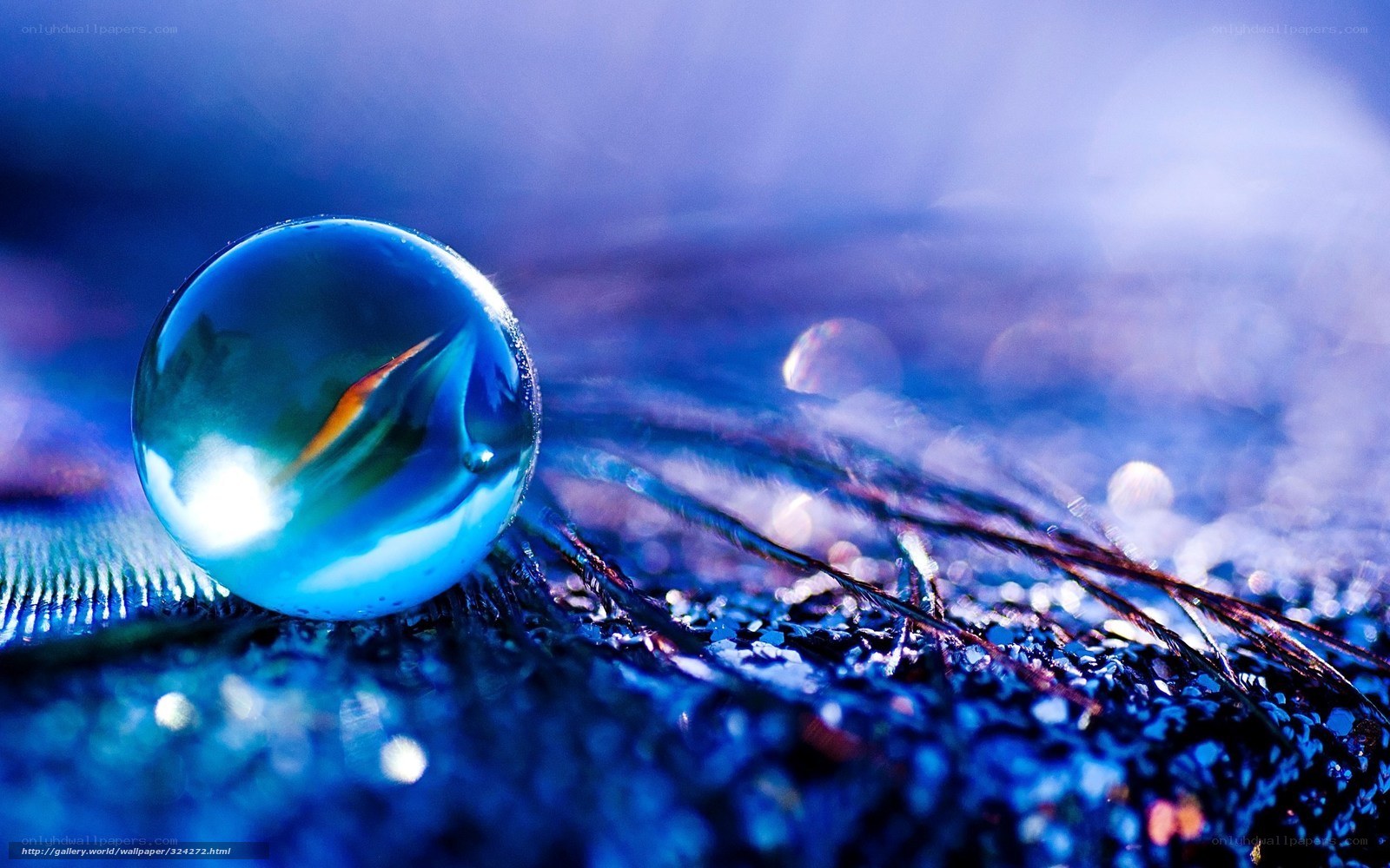 Blue marble on textured surface