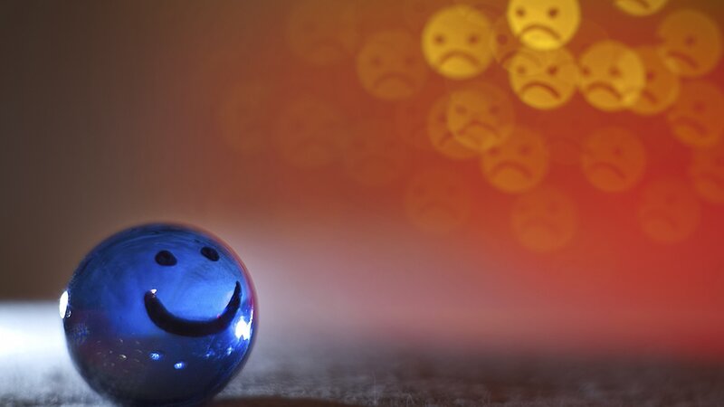 blue marble with smiley face