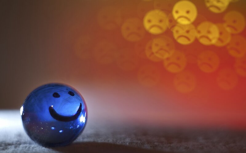 blue marble with smiley face