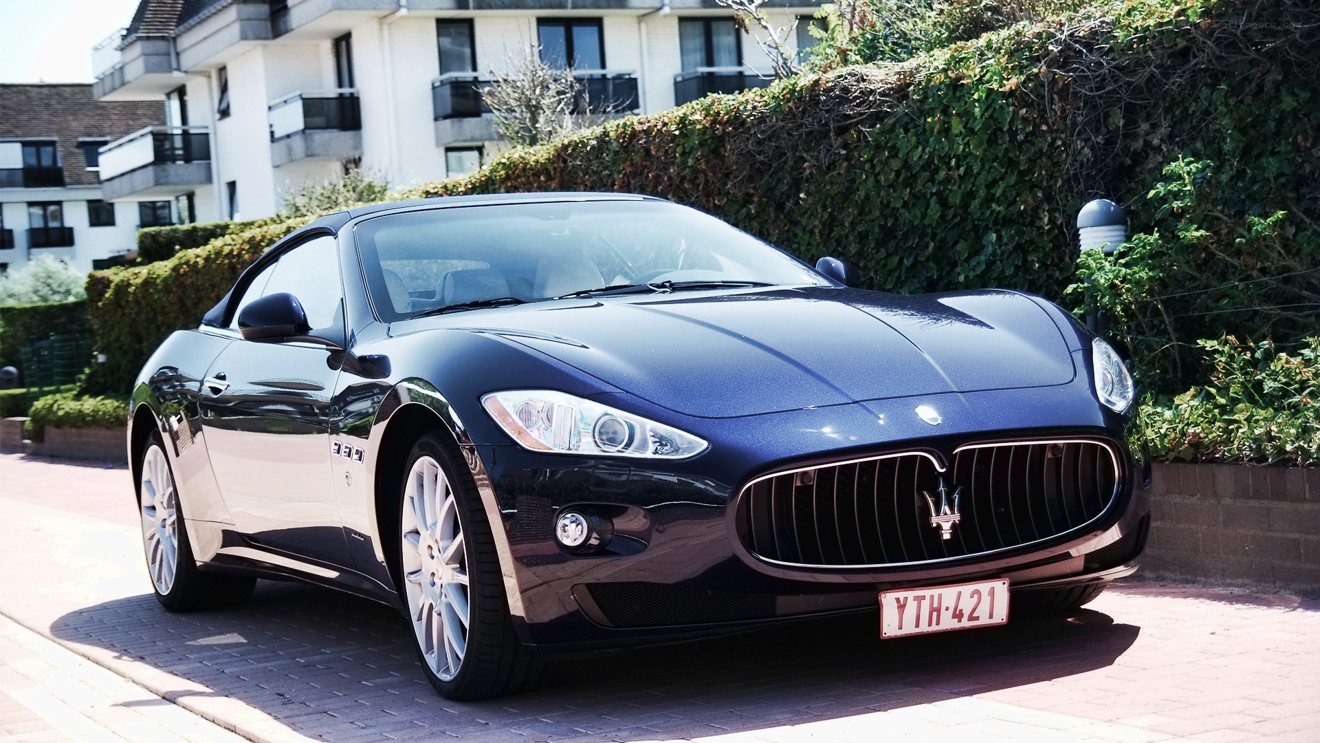 Blue Maserati GranCabrio parked