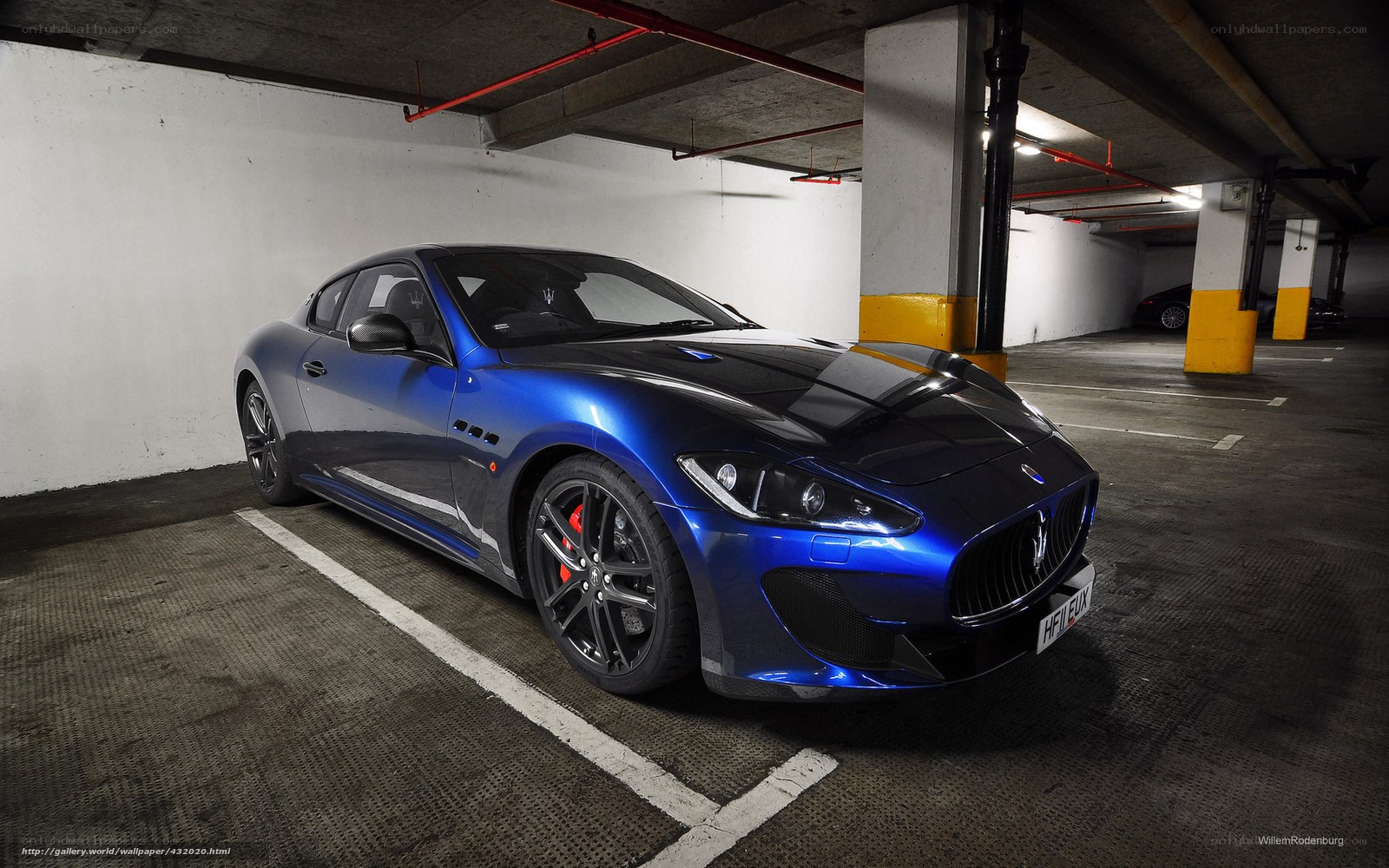 Blue Maserati in parking garage