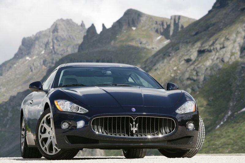 Blue Maserati in the mountains