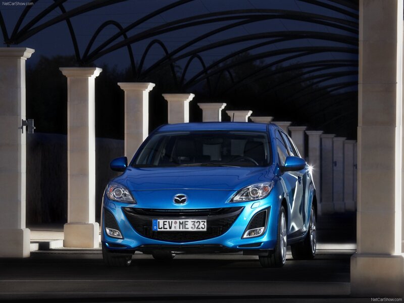 Blue Mazda 3 Hatchback — Dramatic
