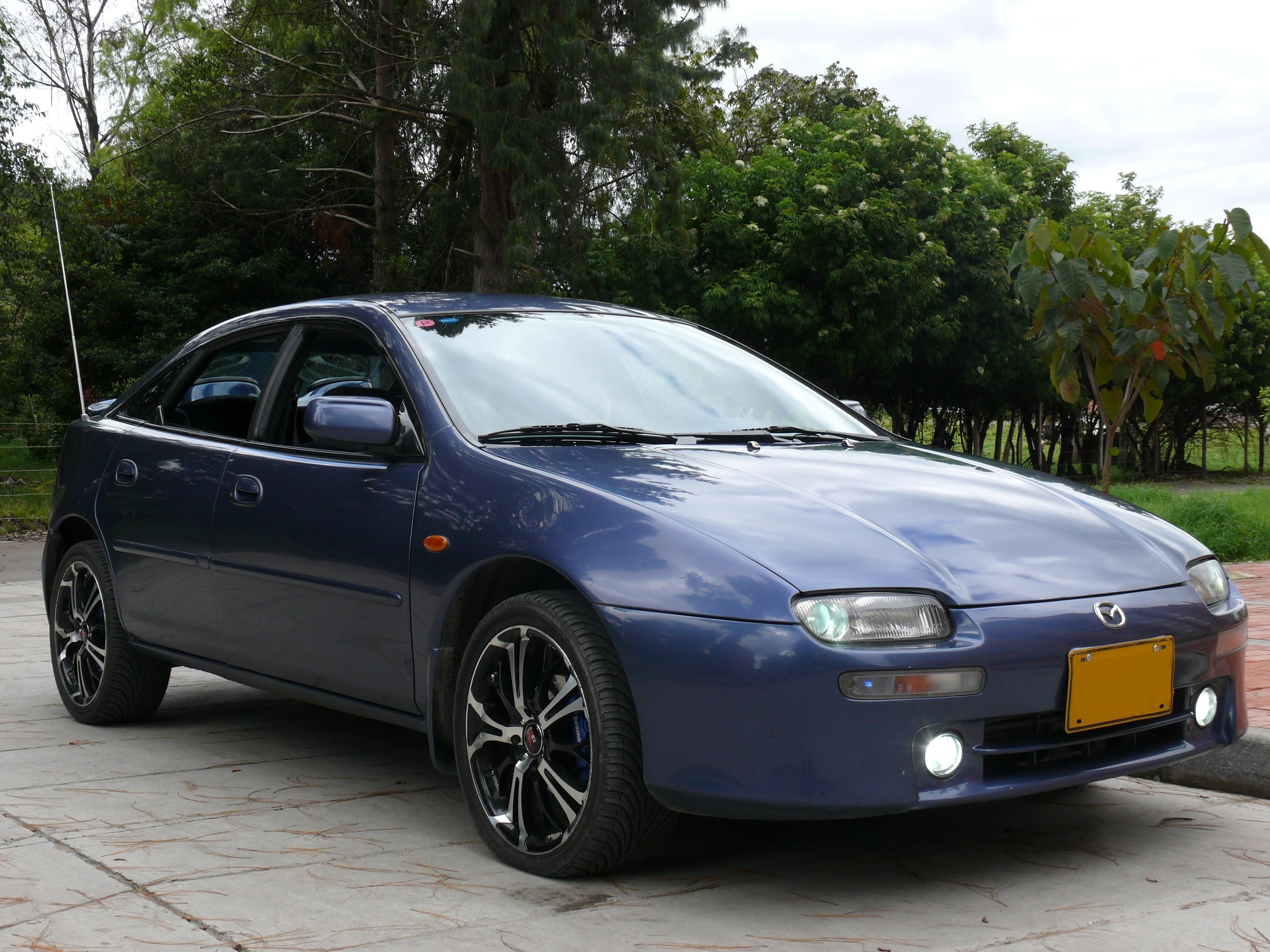 blue mazda 323 sedan