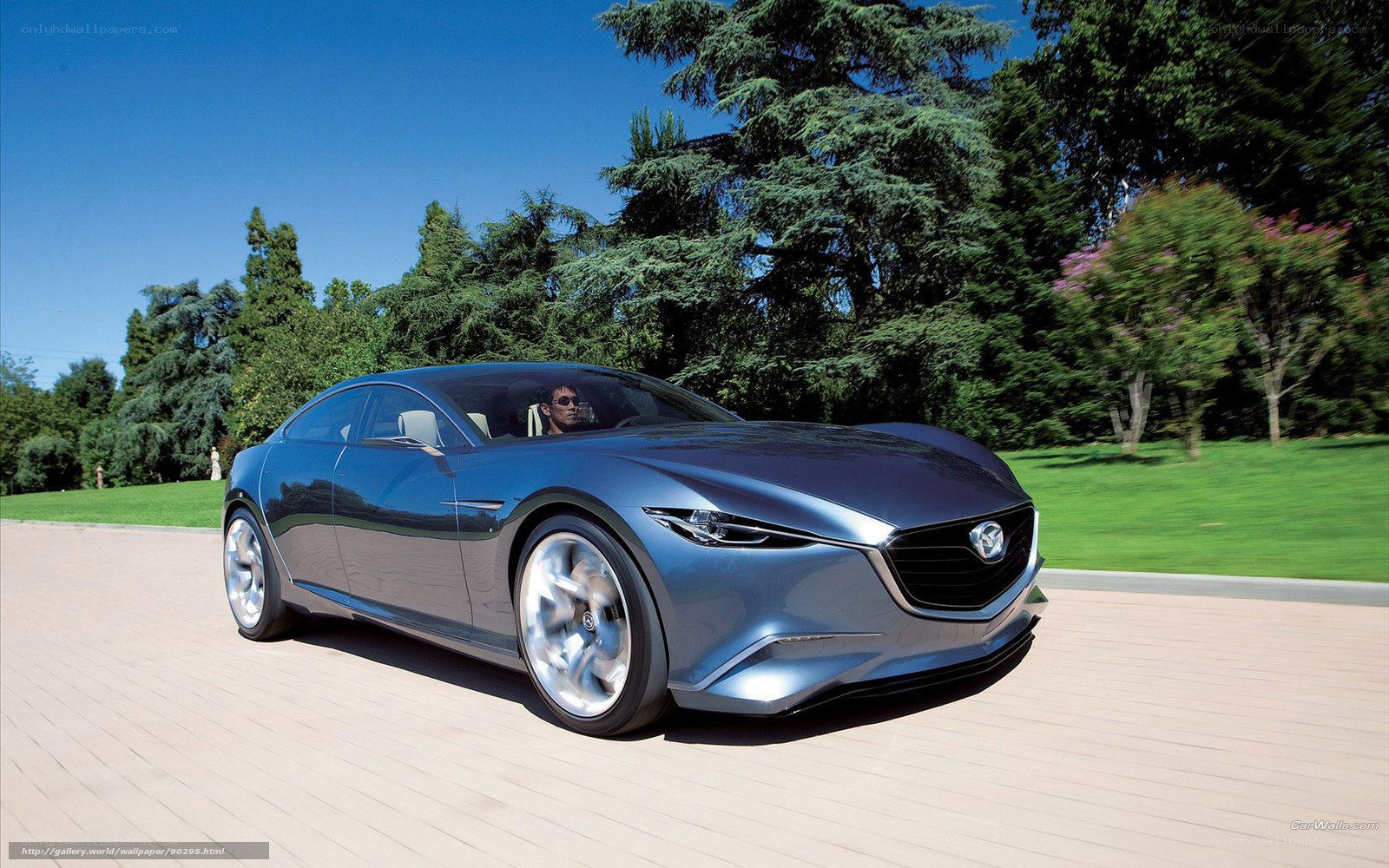 Blue Mazda concept car on road