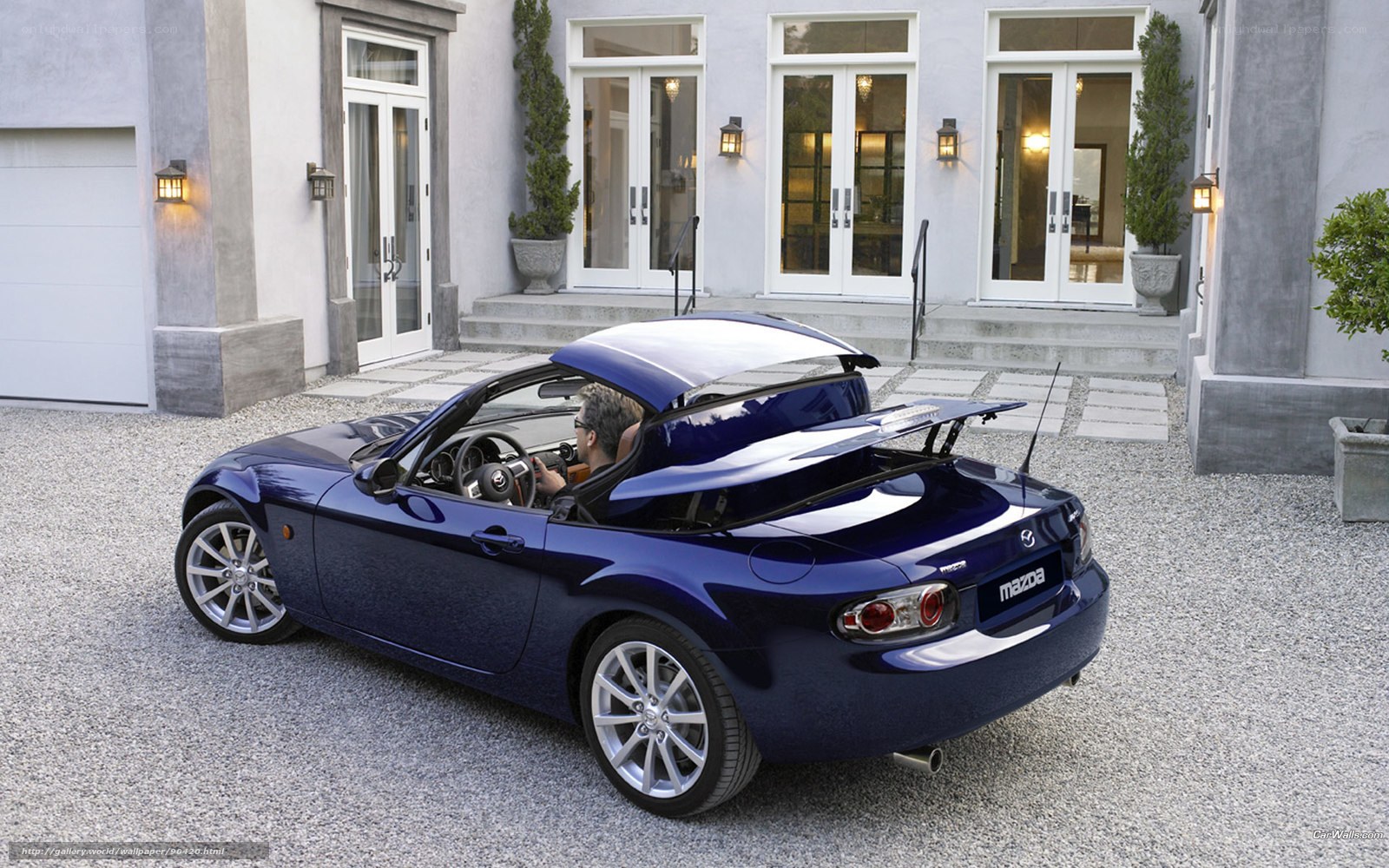 Blue Mazda Miata convertible
