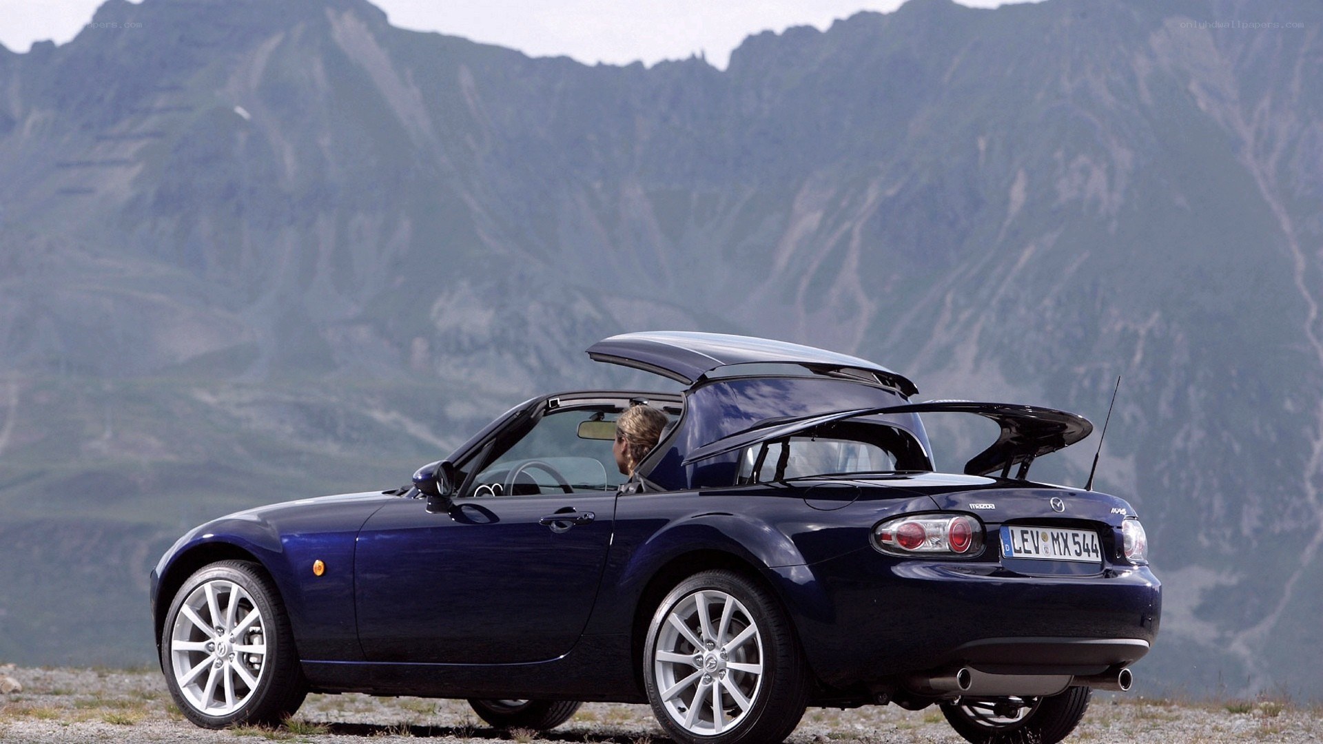 Blue Mazda MX-5 convertible