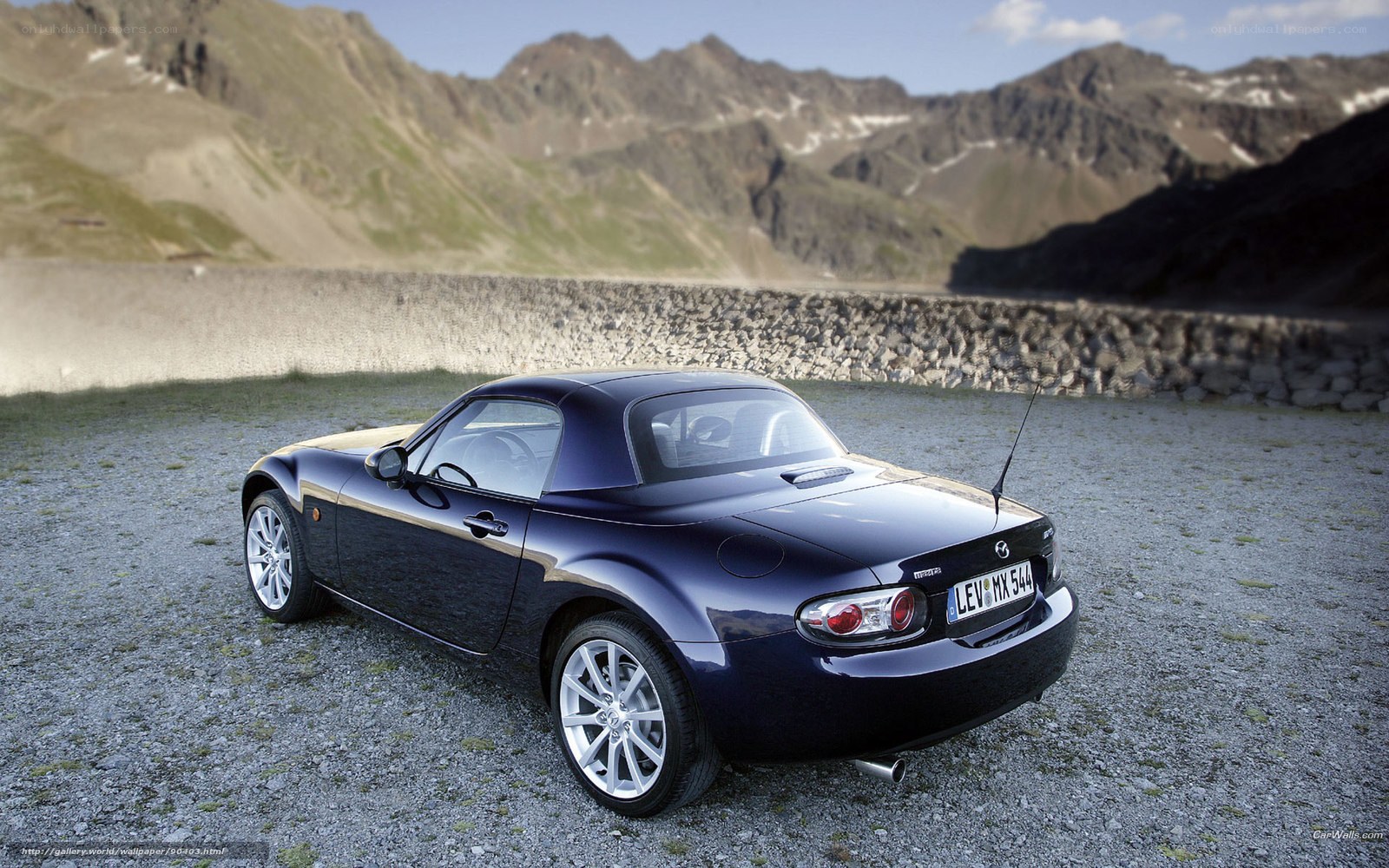 Blue Mazda MX-5 in mountain setting