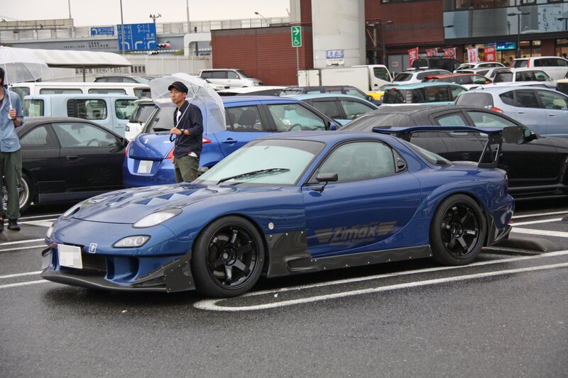 Blue Mazda RX-7 at a car meet